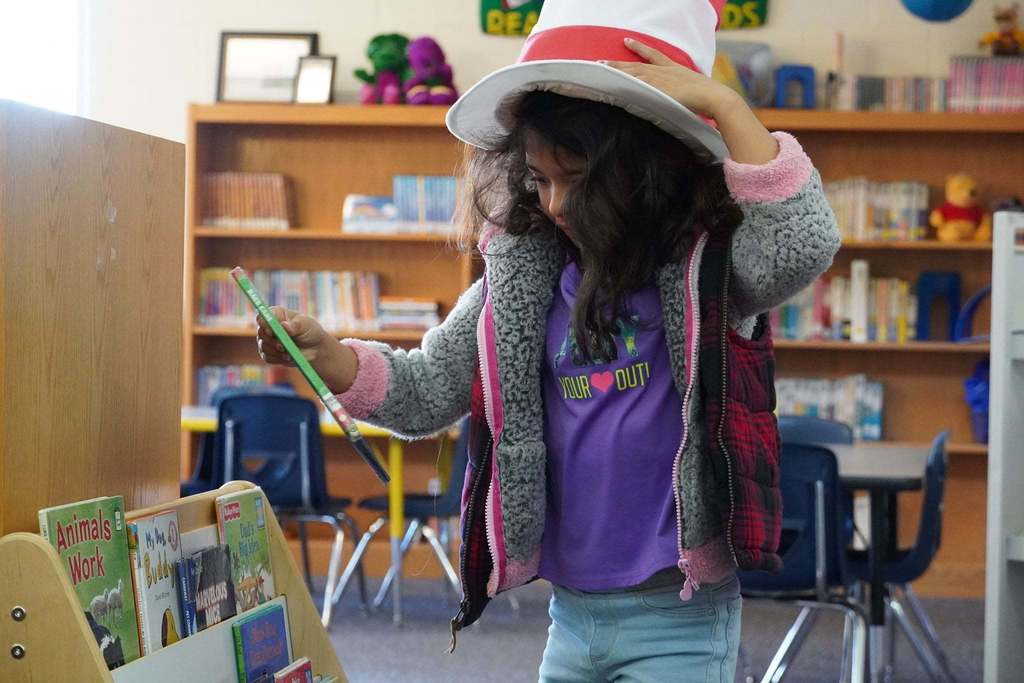 Student in Dr. Seuss hat for Read Across America week